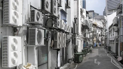 Grave needs of air conditioning in Singapore apartment block. Shutterstock