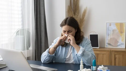 woman-suffering-from-allergies-side-view