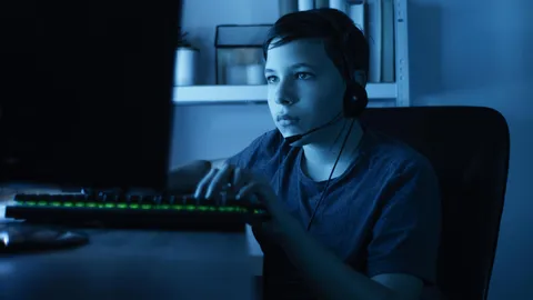 young-boy-playing-on-computer